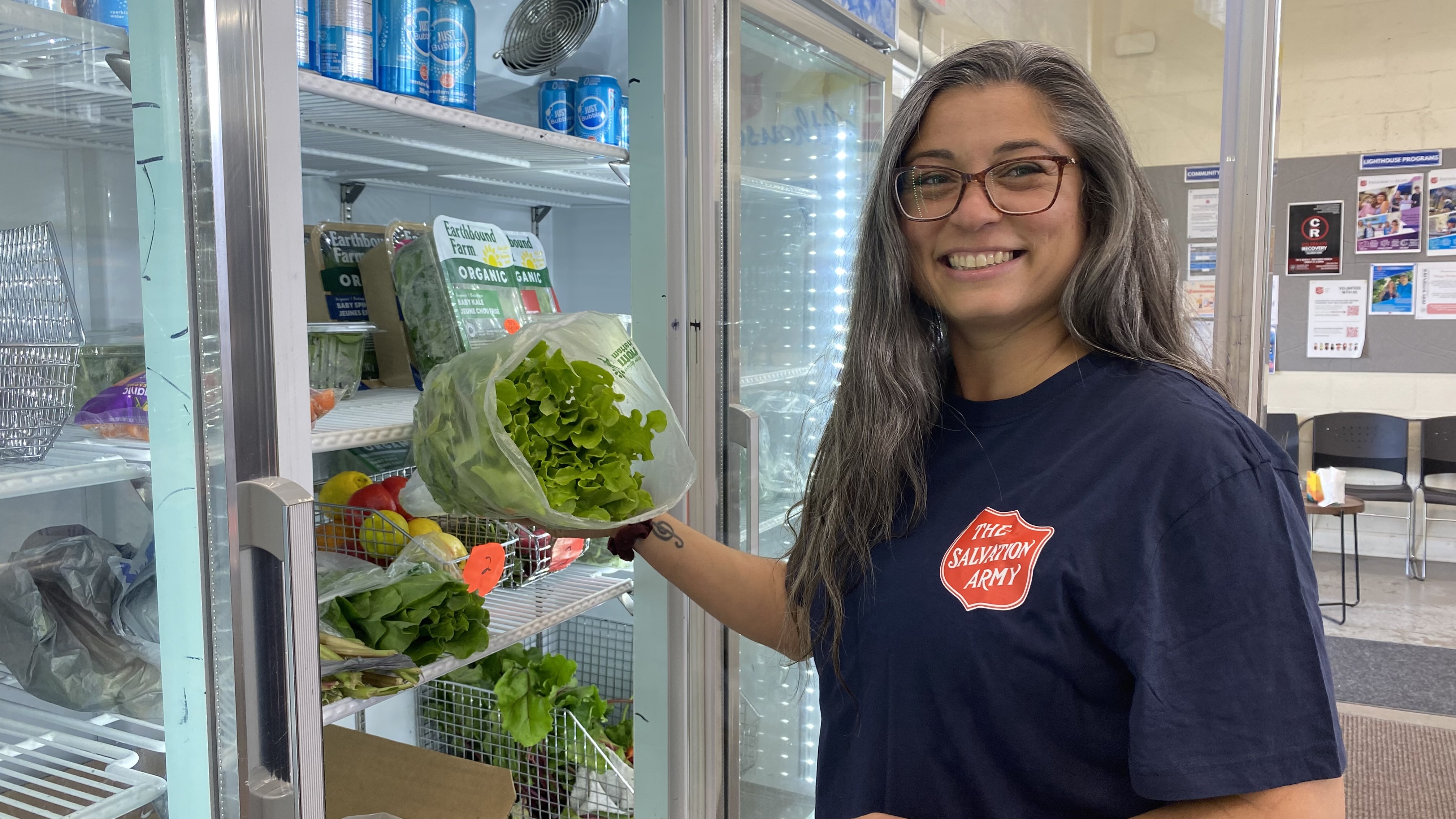 Food bank volunteer prepares fresh food